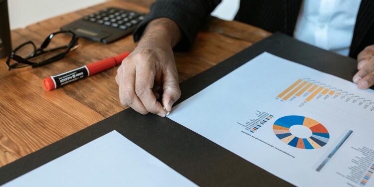 Businesspersons discussing financial reports with a Truth Social logo in the background.