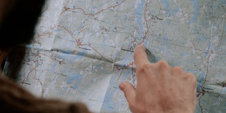 Trump and Iranian officials discussing maritime security over a map of the Strait of Hormuz.