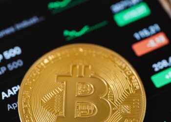 Digital currency symbols with financial charts, representing crypto market growth and investment.