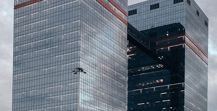 Federal Reserve building with banners indicating interest rate decision amid economic uncertainty.