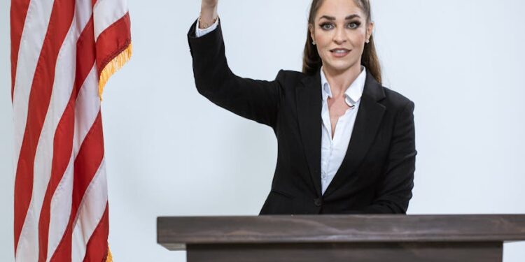 A politician gestures while announcing a ban on crypto donations to political parties.