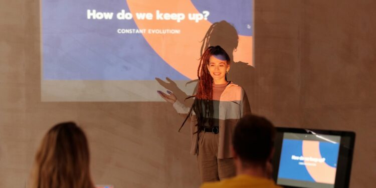 Mark Zuckerberg speaks at a conference, presenting an AI agent for Meta leadership.