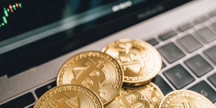 Agents investigating digital currencies on laptops surrounded by crypto symbols and financial charts.