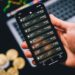 A portrait of a designer working on cryptocurrency concepts for a financial app.