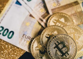 A digital coin with the Euro symbol, representing a new stablecoin for the crypto market.