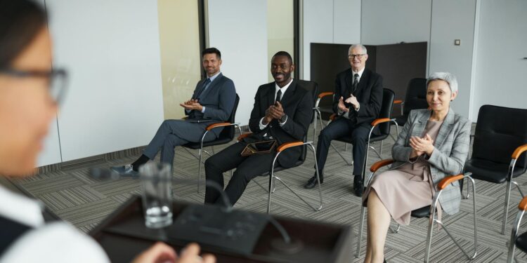 Group of experts discussing cryptocurrency regulations at a conference.