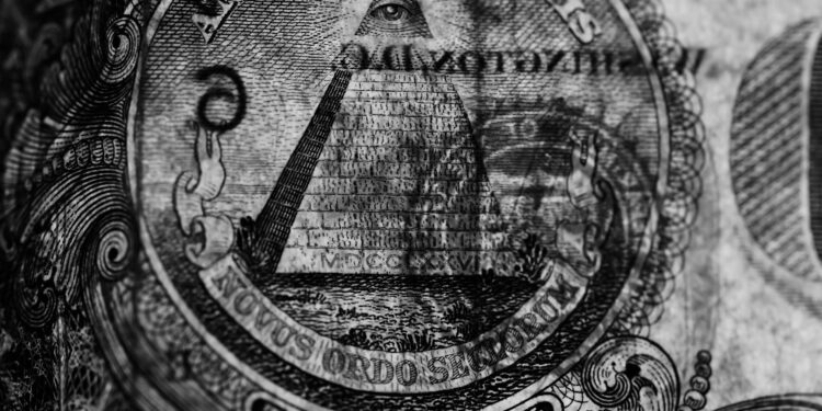 Visual representation of cryptocurrency symbols with a U.S. Treasury seal and barbed wire backdrop.