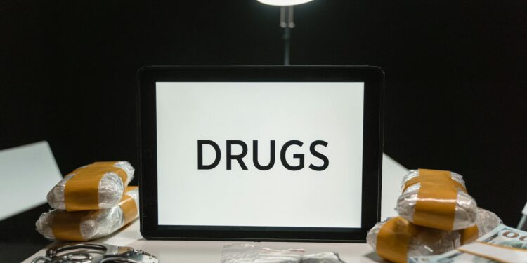 Irish police display seized Bitcoin in a secure environment following a drug-related investigation.