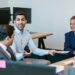 Fidelity employees discussing regulatory compliance for cryptocurrency services.