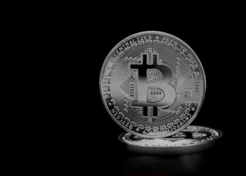 A digital representation of tokenized deposits with currency symbols for foreign exchange.