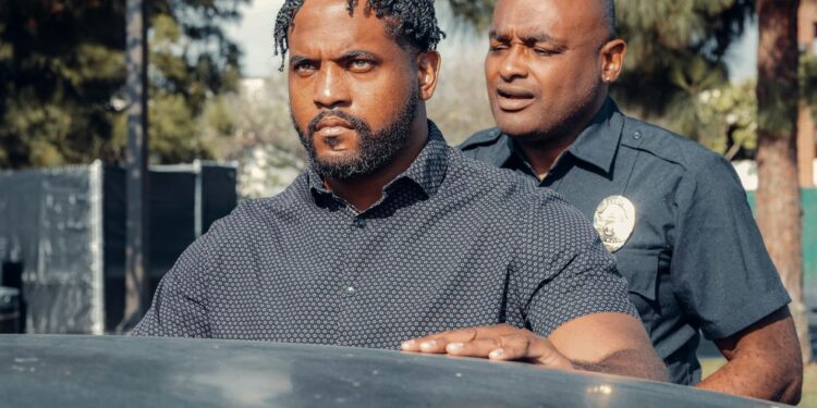 A police badge and crypto coins representing theft and financial crime.