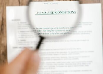 Legislators discuss the DEATH BETS Act at a podium, emphasizing regulation on finance.