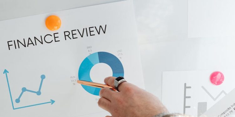 Financial advisor reviewing cryptocurrency options for 401(k) plans with charts and graphs.