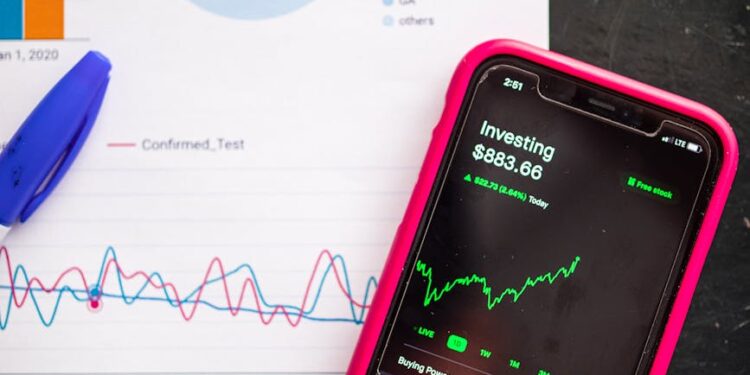 Graph showing Ripple's stock performance with a dollar sign and upward trend arrows.