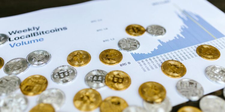 Tom Lee speaking at a financial conference, with charts on crypto trends in the background.