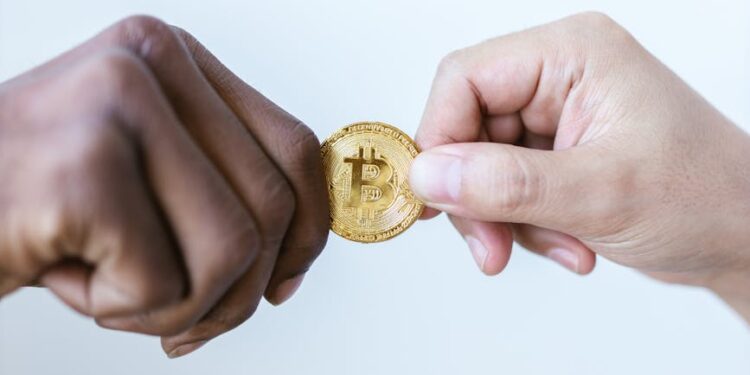 Two hands shaking above a digital currency graph, symbolizing finance collaboration.
