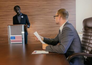 Senate committee members discussing cryptocurrency regulation in a conference setting.