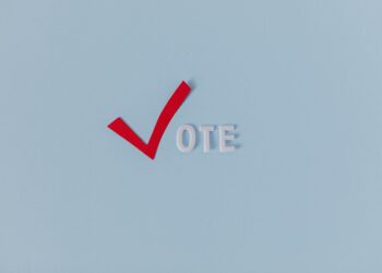 Aave logo with Ethereum symbol, highlighting the launch of Aave V4 and governance vote results.