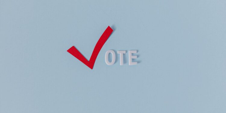 Aave logo with Ethereum symbol, highlighting the launch of Aave V4 and governance vote results.