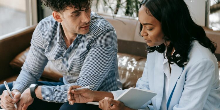 Meta executives discuss AI infrastructure partnership with Nebius in a modern office setting.