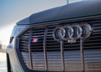 Graphic showing TRON and Reown logos with multichain dApp icons in the background.