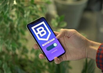 A smartphone displaying Telegram's interface with a wallet feature for TON cryptocurrency.