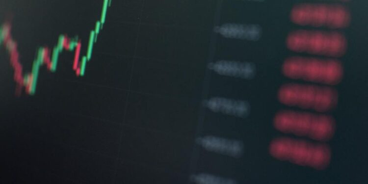 Stocks rising on a digital screen with financial graphs, symbolizing market optimism.