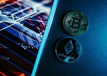 Bitcoin and Ethereum symbols with a calculator, representing smart contract audits in crypto finance.