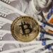 Stacks of US dollar bills alongside digital currency symbols, highlighting crypto demand.