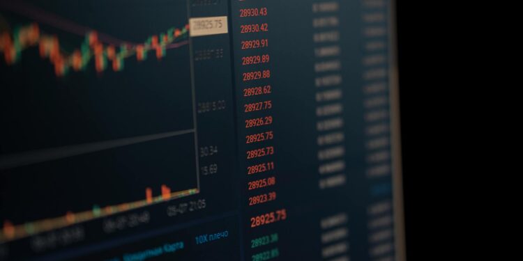 A digital representation of a Kraken logo overlaid on financial charts and cybersecurity symbols.