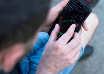 A trader reviews cryptocurrency charts with a focus on USDC lending.