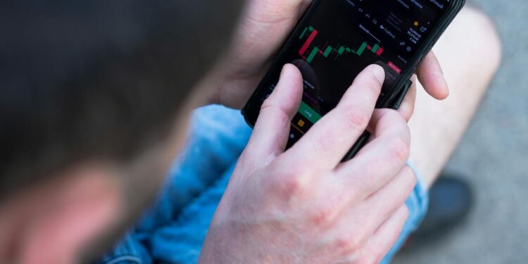 A trader reviews cryptocurrency charts with a focus on USDC lending.