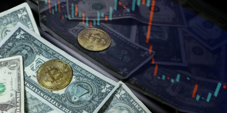 A close-up of a blockchain graphic overlaying a financial chart and dollar bills.