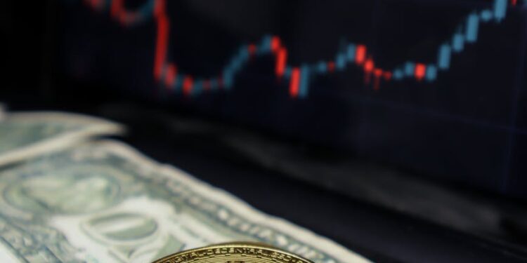 A close-up of a digital dollar coin with financial charts in the background.