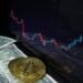 Hands stacking cryptocurrency tokens on a financial chart background, symbolizing investment strategy.