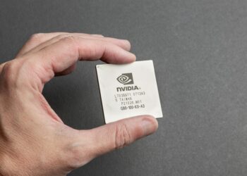 Google's Tensor chips showcased at a tech event, highlighting AI competition with Nvidia.