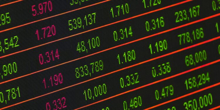 Brent crude oil prices displayed on a digital stock market ticker.