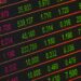 Brent crude oil prices displayed on a digital stock market ticker.
