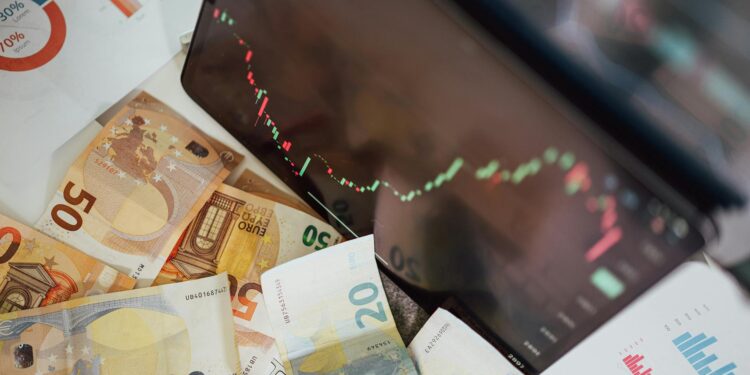 Graphic showing a digital stablecoin symbol with financial charts and currency icons.