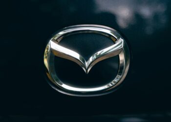 Polymarket logo displayed alongside La Liga emblem, symbolizing new betting partnership.