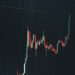 A graph showing rising sales for AlphaPepe and XRP price trends in cryptocurrency.