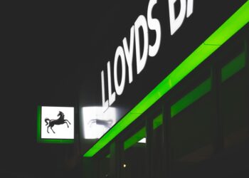 Morgan Stanley logo alongside Bitcoin symbol and NYSE Arca signage in a financial setting.