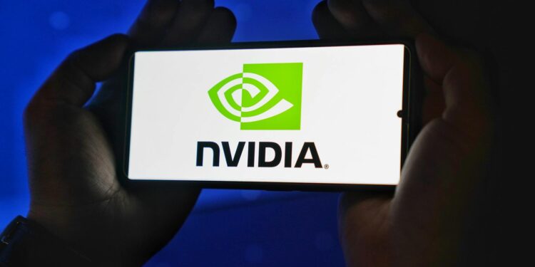 NVIDIA logo displayed with stock market graphs and quantum computing symbols.