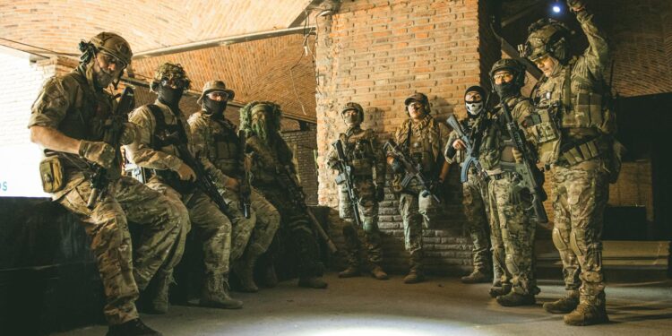 Special Forces operative entering a courtroom, surrounded by media and legal personnel.