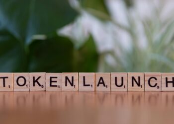 Visual representation of Worldcoin's WLD token and emission reduction strategies in finance.