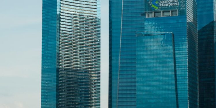 Zodia Custody logo displayed alongside Standard Chartered branding in a corporate setting.