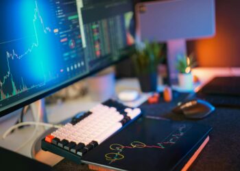 Authorities raiding offices with crypto trading screens and documents scattered on desks.