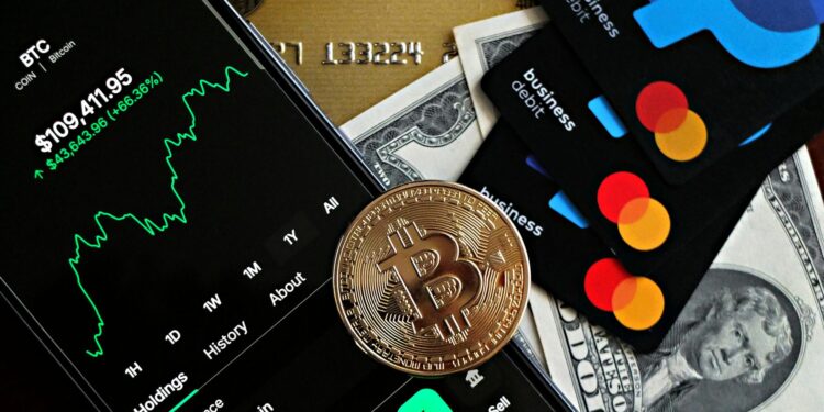 Shinhan Card and Solana logos with digital currency symbols and a financial chart backdrop.