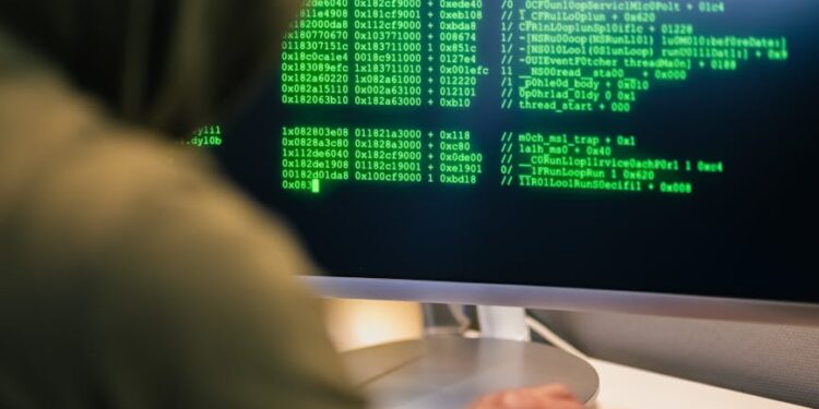 A hacker working on a computer, symbolizing the KelpDAO hack linked to Lazarus Group.