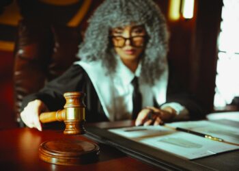 Former FTX engineer at a hearing, highlighting crypto regulation and legal proceedings.